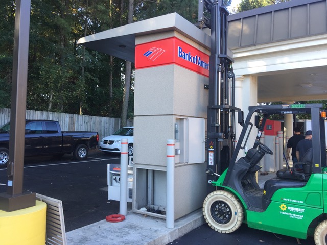 ATM installation and positioning with professional rigging equipment